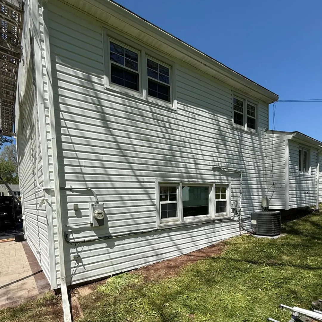 White house with new siding and windows