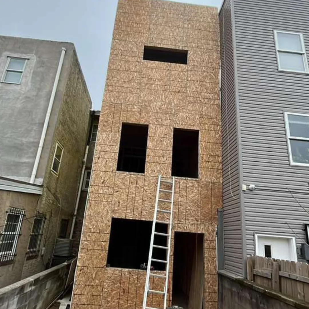 New construction house with plywood sheathing