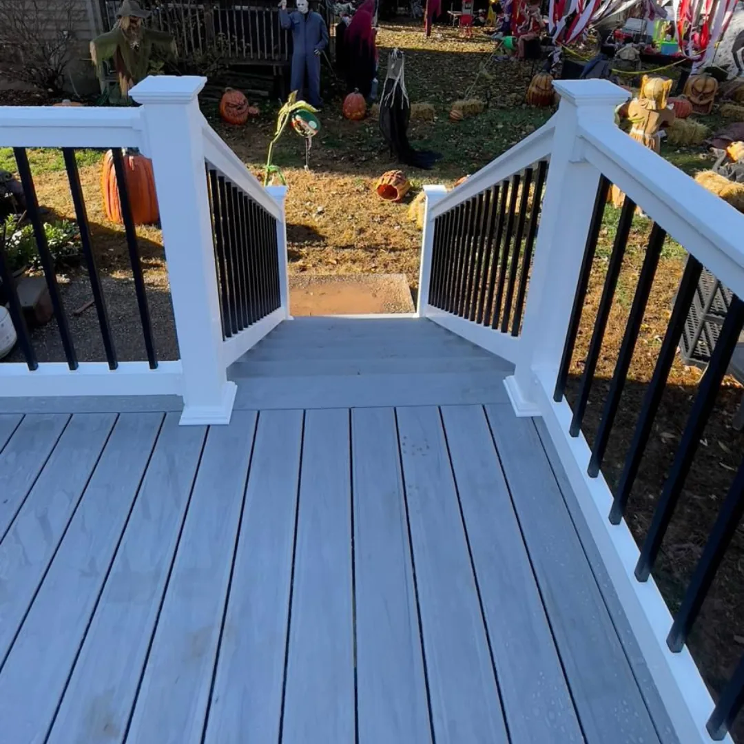 New deck with white railings and stairs